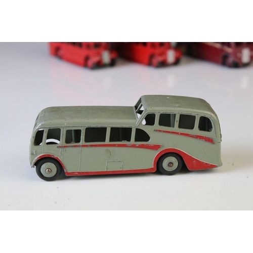 1185 - 16 Mid 20th C play worn Dinky diecast models to include 3 x Foden, 11 x various buses, etc