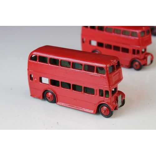 1185 - 16 Mid 20th C play worn Dinky diecast models to include 3 x Foden, 11 x various buses, etc