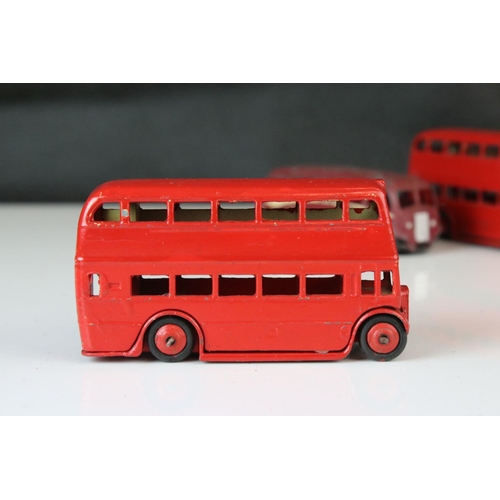 1185 - 16 Mid 20th C play worn Dinky diecast models to include 3 x Foden, 11 x various buses, etc