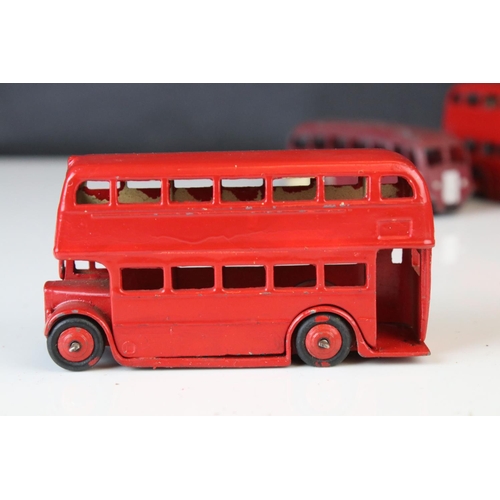 1185 - 16 Mid 20th C play worn Dinky diecast models to include 3 x Foden, 11 x various buses, etc