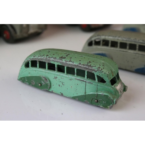 1185 - 16 Mid 20th C play worn Dinky diecast models to include 3 x Foden, 11 x various buses, etc