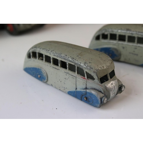 1185 - 16 Mid 20th C play worn Dinky diecast models to include 3 x Foden, 11 x various buses, etc