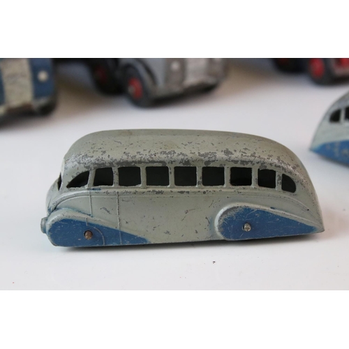 1185 - 16 Mid 20th C play worn Dinky diecast models to include 3 x Foden, 11 x various buses, etc