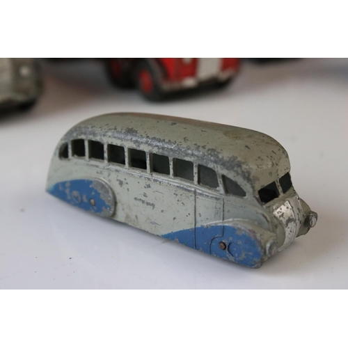 1185 - 16 Mid 20th C play worn Dinky diecast models to include 3 x Foden, 11 x various buses, etc