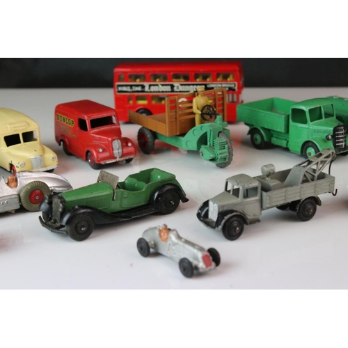 1186 - 12 Mid 20th C Dinky diecast models to include Dunlop Trojan, Daimler Ambulance, Petrol Tanker, Land ... 