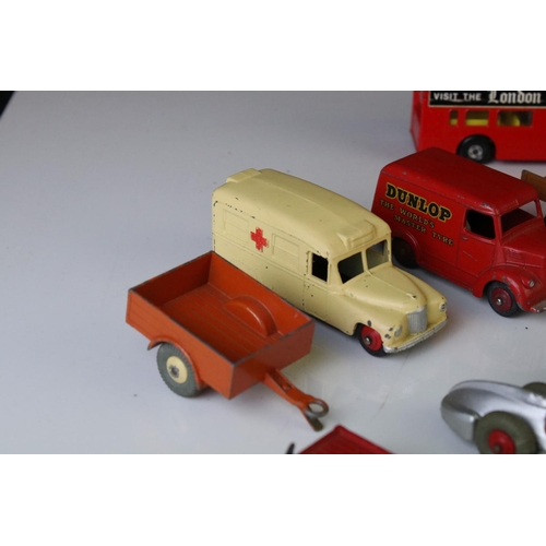 1186 - 12 Mid 20th C Dinky diecast models to include Dunlop Trojan, Daimler Ambulance, Petrol Tanker, Land ... 