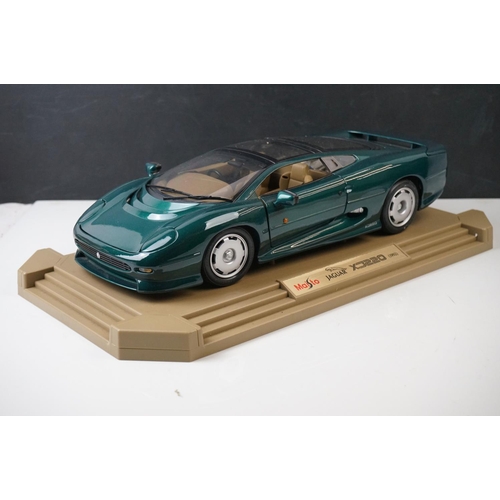 1212 - Four boxed 1:18 scale diecast models to include Corgi  MGF 1.8i VVC Roadster, Autoart Performance Su... 