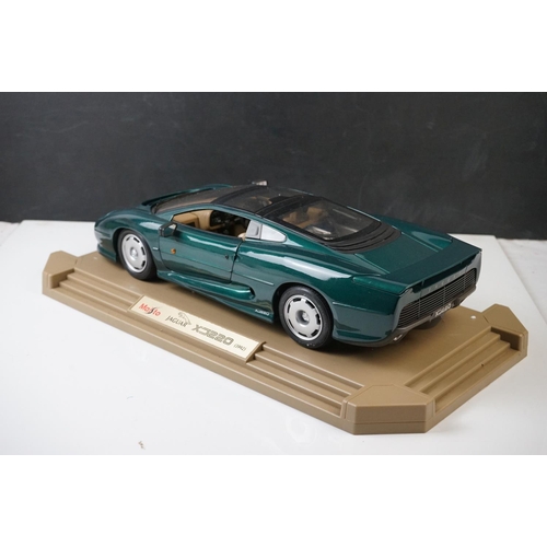 1212 - Four boxed 1:18 scale diecast models to include Corgi  MGF 1.8i VVC Roadster, Autoart Performance Su... 