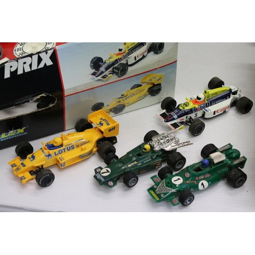 1224 - Large quantity of Scalextric to include 6 x slot cars, various track, controllers etc contained with... 