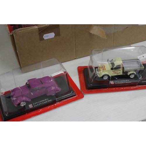 1229 - 12 Cased Hatchette Citroen CV diecast models with magazines/backing cards