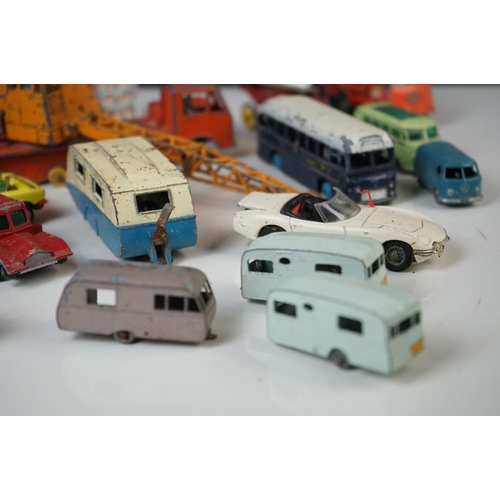 1256 - 14 mid 20th C play worn diecast models to include Dinky, Corgi and Matchbox Lesney featuring Corgi J... 