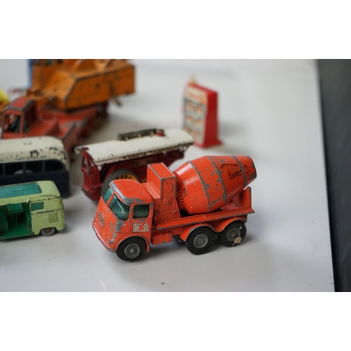 1256 - 14 mid 20th C play worn diecast models to include Dinky, Corgi and Matchbox Lesney featuring Corgi J... 