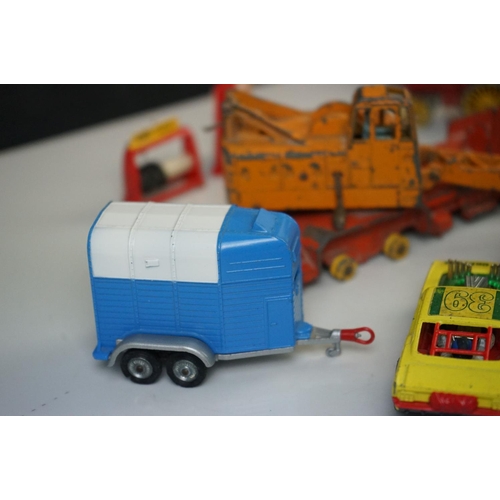 1256 - 14 mid 20th C play worn diecast models to include Dinky, Corgi and Matchbox Lesney featuring Corgi J... 