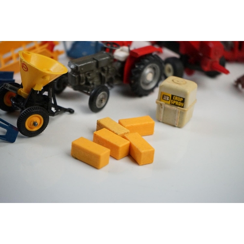 1259 - Group of Britains diecast and plastic farming vehicles and accessories to include New Holland TR85