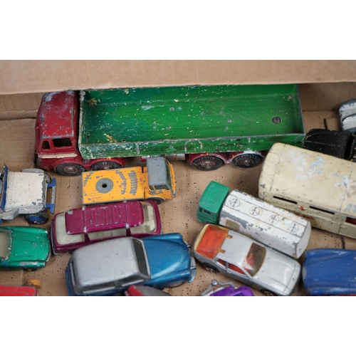 1261 - 40 Original mid 20th C heavily play worn diecast models to include Dinky, Matchbox Lesney and Corgi