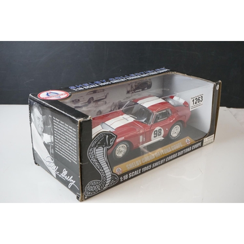 1263 - Four boxed 1/18 diecast models to include 2 x Hot Wheels Racing (50170 Juan Pablo Montoya & T26 Fern... 