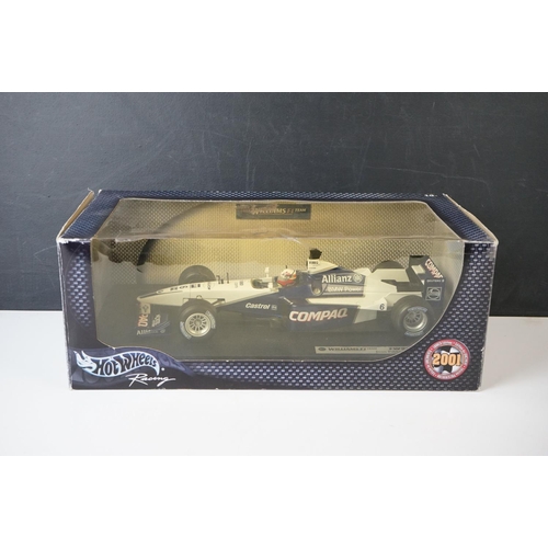 1263 - Four boxed 1/18 diecast models to include 2 x Hot Wheels Racing (50170 Juan Pablo Montoya & T26 Fern... 