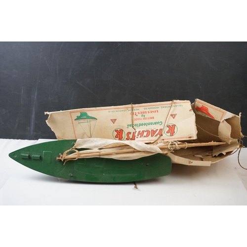 1288 - Boxed Triang Yacht in green (damaged box) plus Triang wooden truck, red crane and an unmarked artill... 