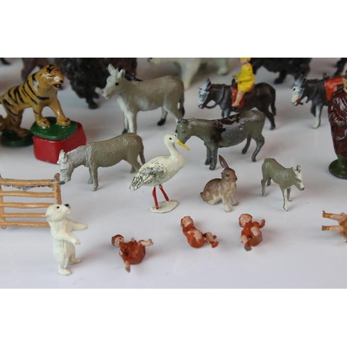 1298 - Quantity of mid 20th C metal zoo animals and zoo accessories to include Britains examples, vg overal... 