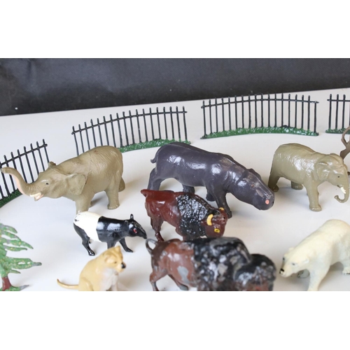 1298 - Quantity of mid 20th C metal zoo animals and zoo accessories to include Britains examples, vg overal... 