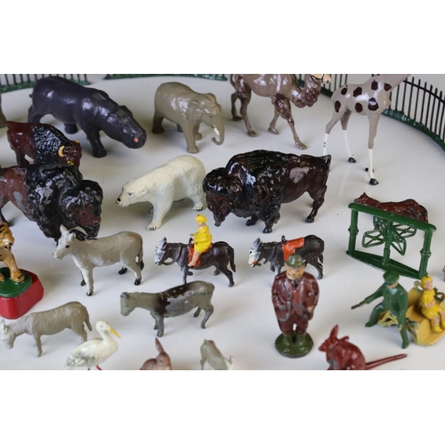 1298 - Quantity of mid 20th C metal zoo animals and zoo accessories to include Britains examples, vg overal... 