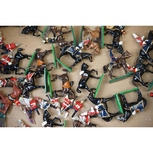 1344 - Collection of vintage metal horseback figures, features 29 horses in total, gd condition