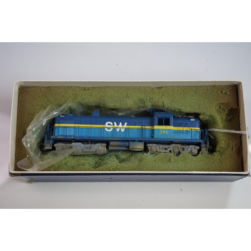 155 - Boxed Alco HO gauge SW 396 brass locomotive (Japan), painted, appearing excellent with box showing s... 