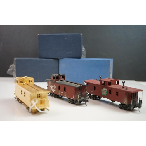 276 - Three boxed HO gauge brass Caboose models to include 2 x CNR Modern Caboose (one painted, one unpain... 