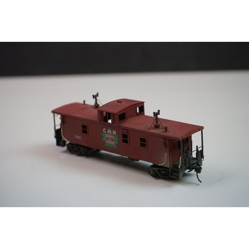 276 - Three boxed HO gauge brass Caboose models to include 2 x CNR Modern Caboose (one painted, one unpain... 