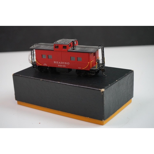 277 - Three boxed HO gauge Nickel Plate Product items of brass rolling stock to include 2 x Reading Caboos... 