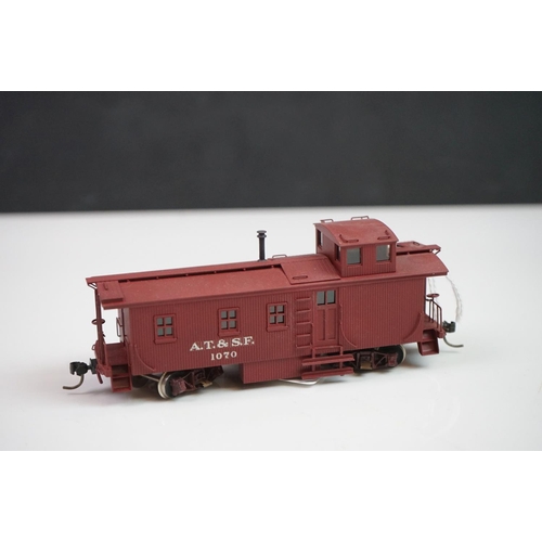 285 - Three boxed HO gauge items of rolling stock to include Trains Inc Santa Fe Side Door Caboose (painte... 