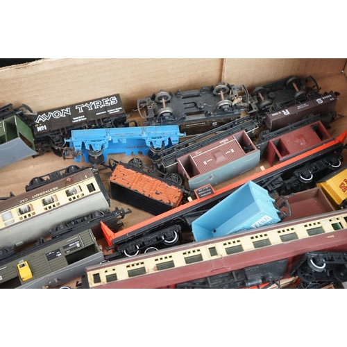 322 - Collection of approximately 42 OO gauge items of rolling stock to include trucks, wagons, coaches, c... 