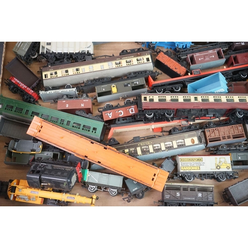 322 - Collection of approximately 42 OO gauge items of rolling stock to include trucks, wagons, coaches, c... 