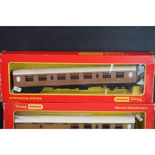 330 - Three boxed Triang Hornby OO gauge coaches (tatty boxes) plus 10 x items of OO gauge rolling stock t... 