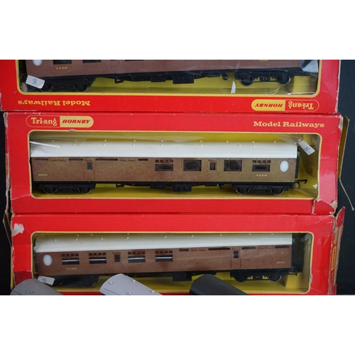 330 - Three boxed Triang Hornby OO gauge coaches (tatty boxes) plus 10 x items of OO gauge rolling stock t... 