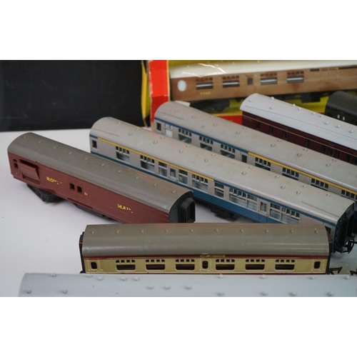 330 - Three boxed Triang Hornby OO gauge coaches (tatty boxes) plus 10 x items of OO gauge rolling stock t... 