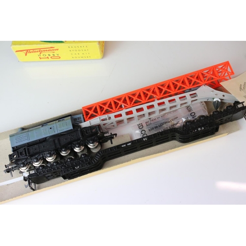 348 - Collection of Fleischmann HO gauge rolling stock contained in 9 boxes, a few part built examples, fe... 