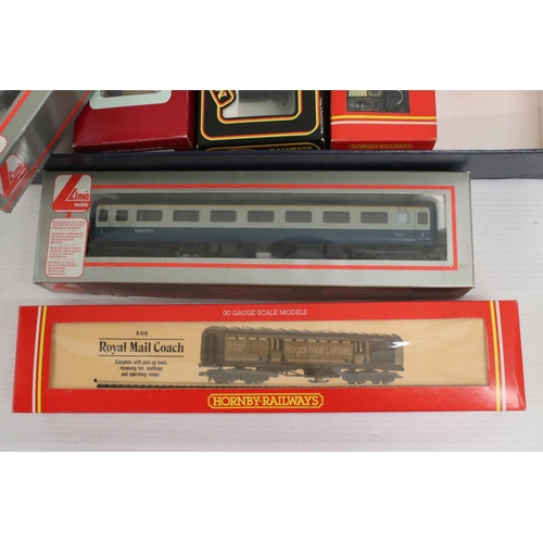 357a - 11 Boxed OO gauge items of rolling stock to include 3 x Hornby (featuring R416 Royal Mail Coach), 5 ... 