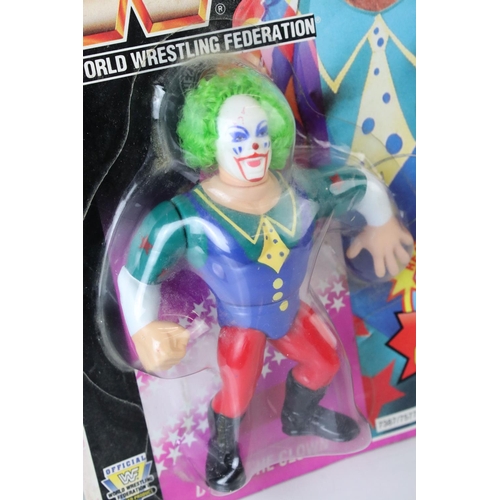 378 - WWF / WWE Wrestling - Original carded Hasbro WWF Doink The Clown figure on pink card, crease around ... 