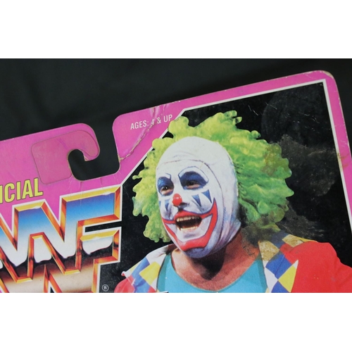 378 - WWF / WWE Wrestling - Original carded Hasbro WWF Doink The Clown figure on pink card, crease around ... 