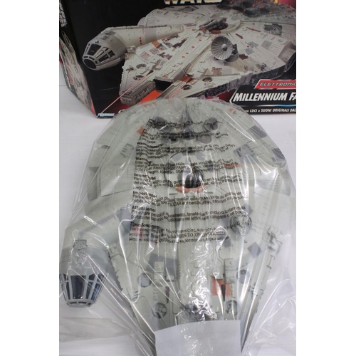 406 - Star Wars - Three boxed Kenner Star Wars vehicles to include electronic Millennium Falcon (no Englis... 