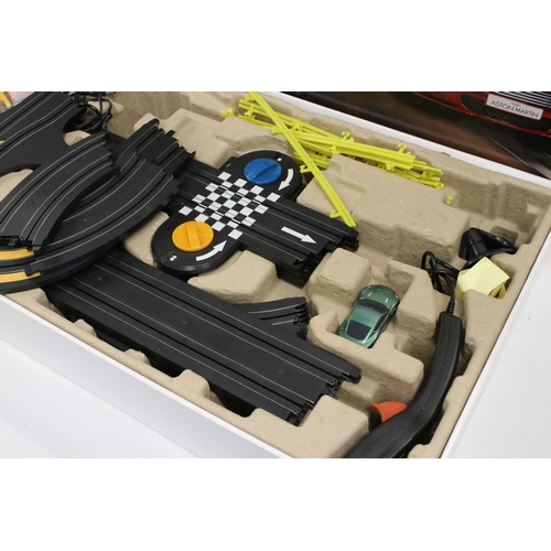 448 - Two boxed Scalextric sets to include Micro Scalextric DBS Supercars (missing one slot car) and Escor... 