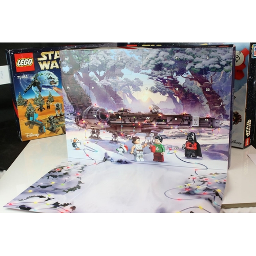 452 - Four boxed Lego advent calendars to include 3 x Star Wars 75184, 72213 and 75279, and Lego City 6020... 