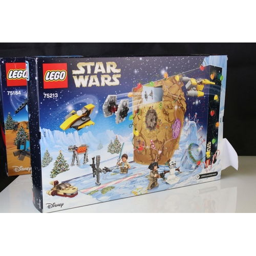 452 - Four boxed Lego advent calendars to include 3 x Star Wars 75184, 72213 and 75279, and Lego City 6020... 