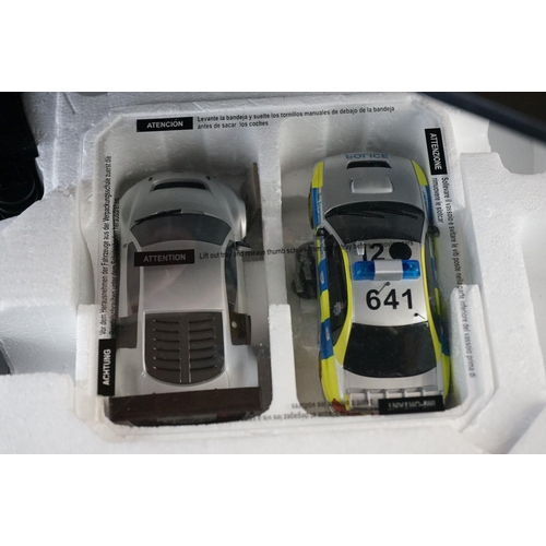 469 - Two boxed Scalextric 1:32 sets to include C1282 Crime Patrol and C1199 Street Pursuit (tatty box), b... 