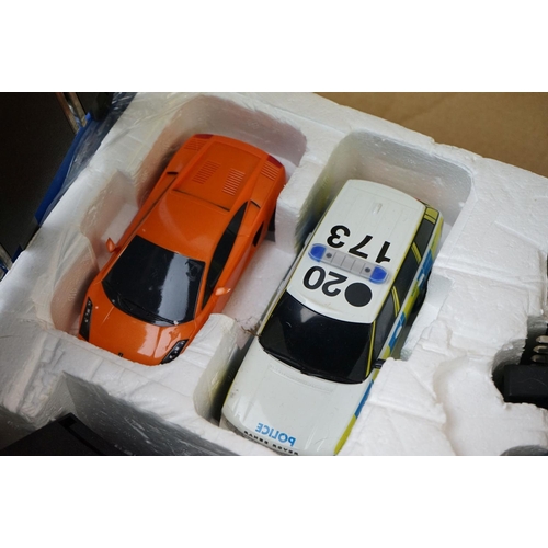 469 - Two boxed Scalextric 1:32 sets to include C1282 Crime Patrol and C1199 Street Pursuit (tatty box), b... 