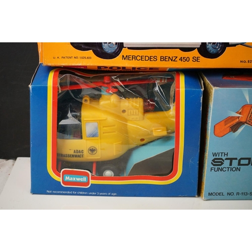 473 - 10 x Boxed battery operated and wind up toys to include BMW M1, Motorschift MS 65, Superschnelle Ren... 