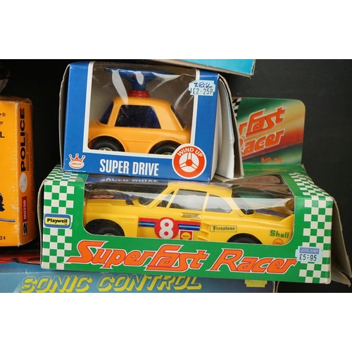 473 - 10 x Boxed battery operated and wind up toys to include BMW M1, Motorschift MS 65, Superschnelle Ren... 