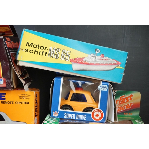 473 - 10 x Boxed battery operated and wind up toys to include BMW M1, Motorschift MS 65, Superschnelle Ren... 