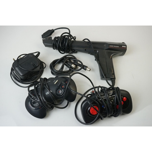 487 - Retro Gaming -  Unboxed Sega Master System console (untested), with 2 x  Mega Drive controllers (one... 